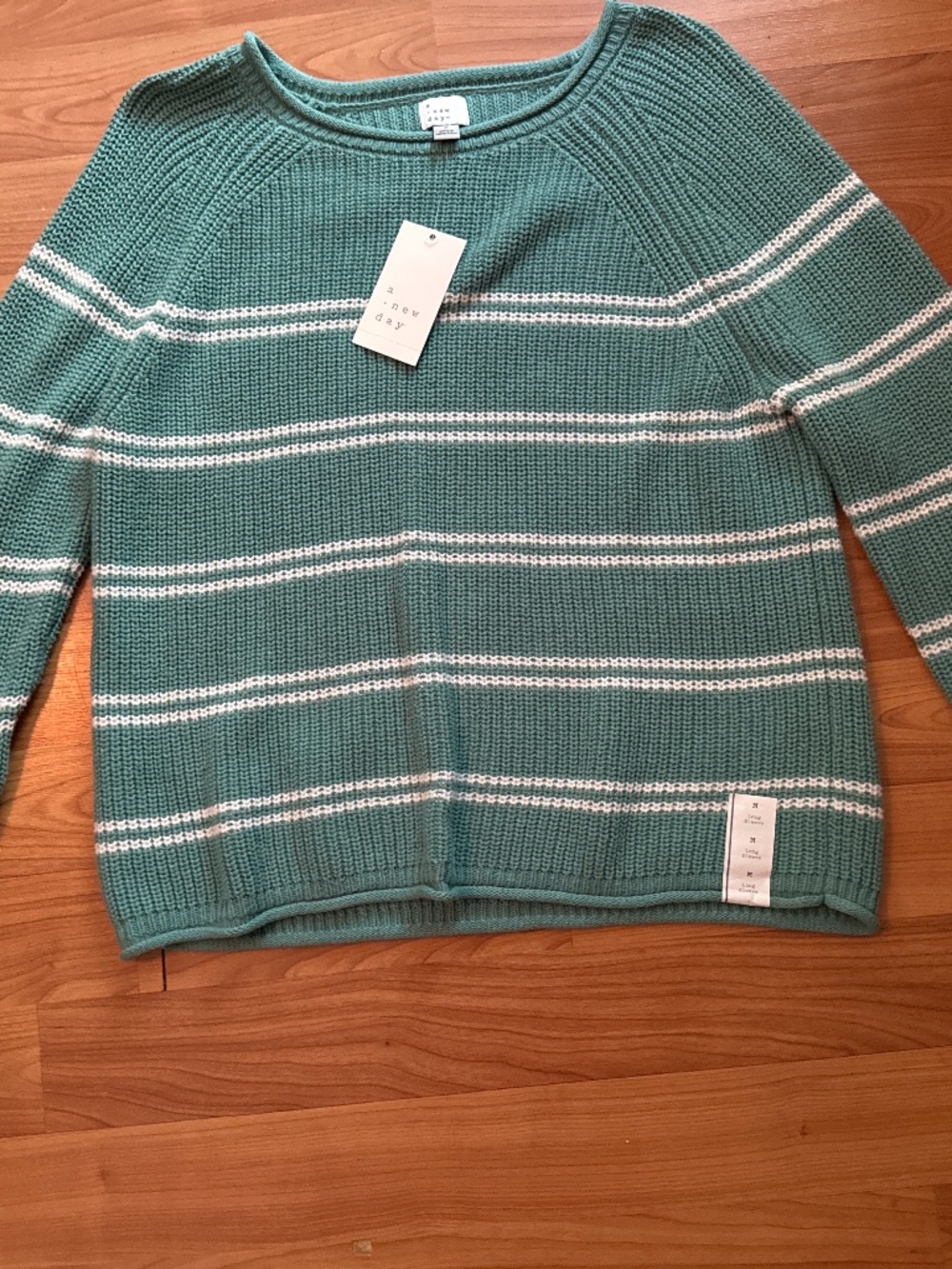 A New Day sweater